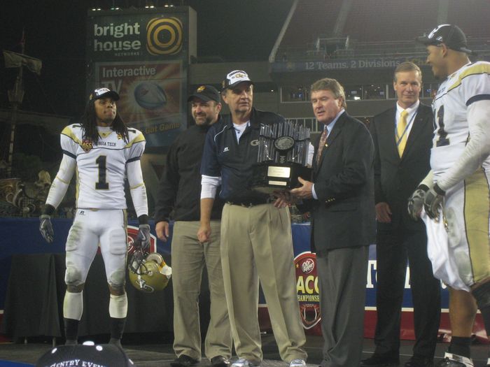 ACC Championship trophy — Georgia Tech coach Paul Johnson with ACC Commissioner John Swofford — with Joseph Heilner of CatalysCo
