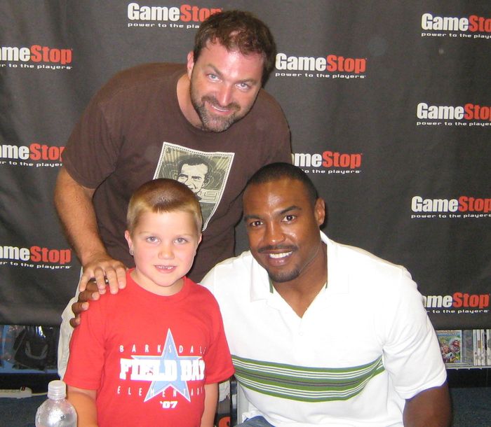 Joseph Heilner and Mark Heilner with Cowboys' Darren Woodson — with Joseph Heilner of CatalysCo