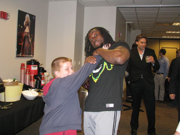 Mark Heilner with WWE star Kofi Kingston — with Joseph Heilner of CatalysCo
